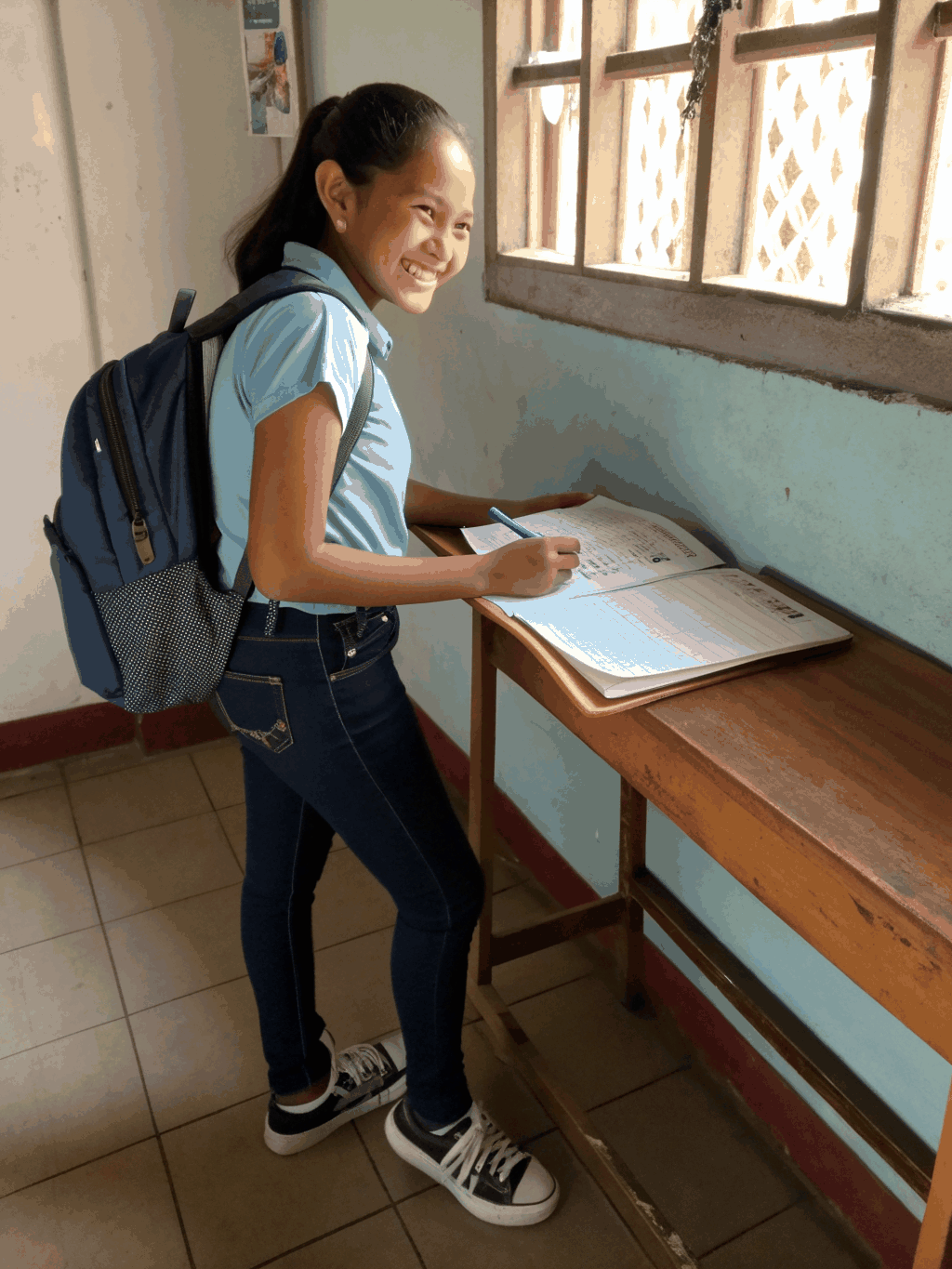 Portrait photo of student Ayesha Khan smiling